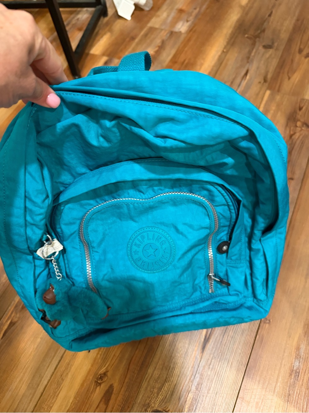 Kipling Turquoise Backpack with Front Pocket and Keychain